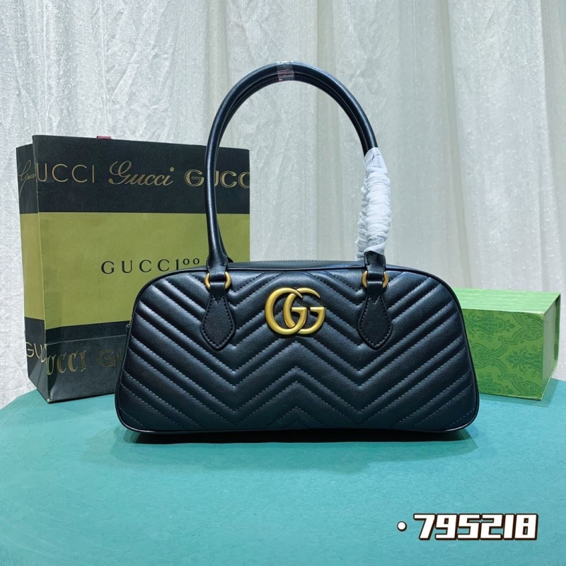 G*u*i top handle bags